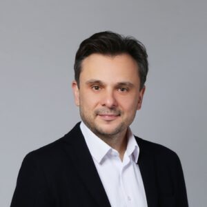 Business photo of CEO and founder of Systerion, Miroslaw Woszczyna